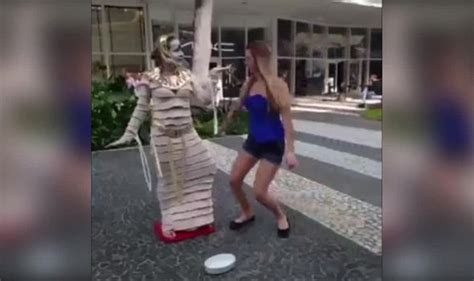 Tourist Touches Street Performer But Suffers Instant Karma When This