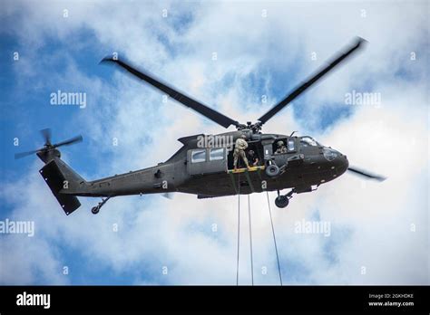 25th Infantry Division Soldiers Rappel From A Uh 60 Black Hawk During A