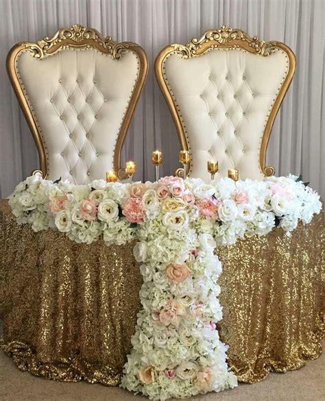 Check out some stunning bride and groom chair decorations & get inspired. Wedding Day Quirks | Sweetheart table wedding, Wedding table
