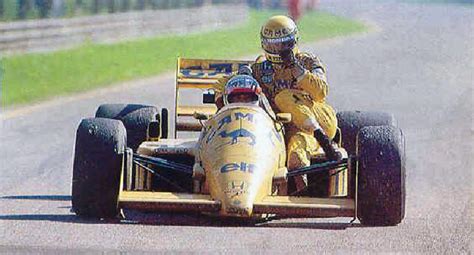 Monza 1987 Satoru Nakajima Lotus 99t Giving A Lift To Team Mate