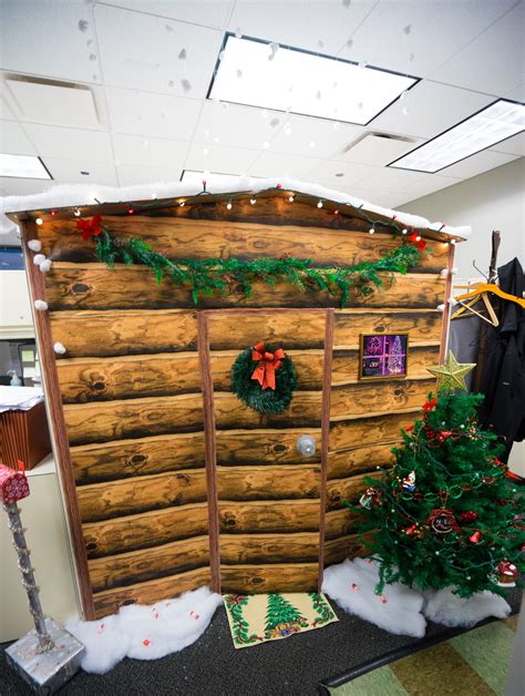 Work Cubicle Turned Into A Christmas Log Cabin Made Out Of Cardbo