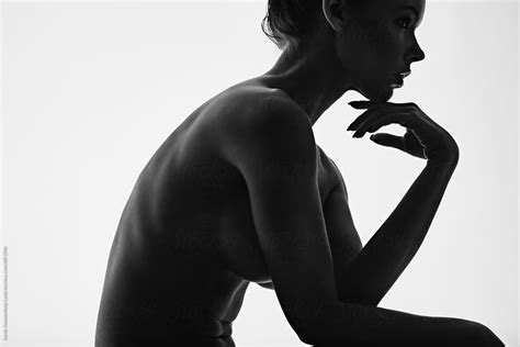 Silhouette Of Thoughtful Naked Woman By Stocksy Contributor Jacob Lund Stocksy