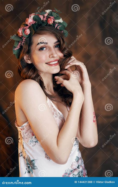 Sensual Beautiful Woman Portrait With Wreath Of Flowers In Her Hair