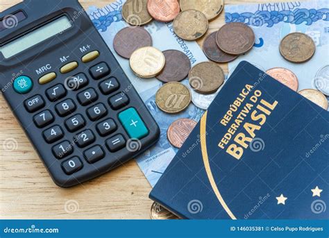 Calculator and Money To Calculate the Cost of a Trip Stock Image