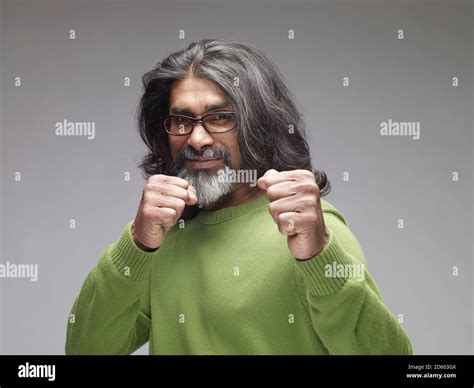 Mature Man Showing Fists Looking Confident Portrait Stock Photo Alamy