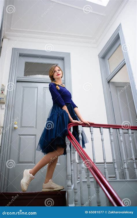 Elegant Woman In Blue Dress Poses On The Stairs Stock Image Image Of