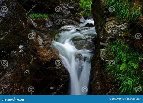 Little Waterfall Over Rocks With Green Plants Stock Image Image Of