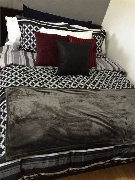 These beddings add a little zing to bedroom that is huge in size. Black, white, gray, and maroon themed bedding! Comfy ...