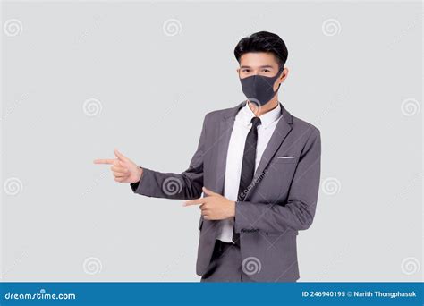 Portrait Young Asian Businessman In Suit Wearing Face Mask For