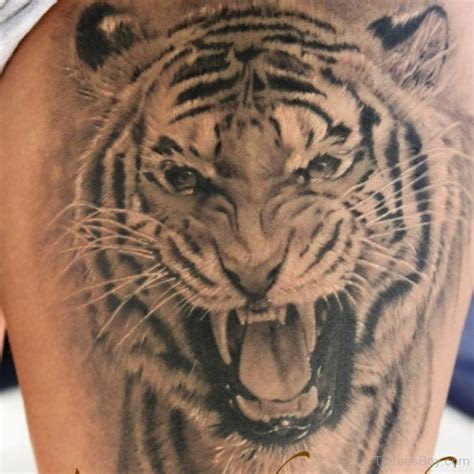 If you are aiming for a minimalist yet bold tattoo, this eye of the tiger tattoo is the perfect lion tattoo for your body. Tiger Tattoos | Tattoo Designs, Tattoo Pictures | Page 5