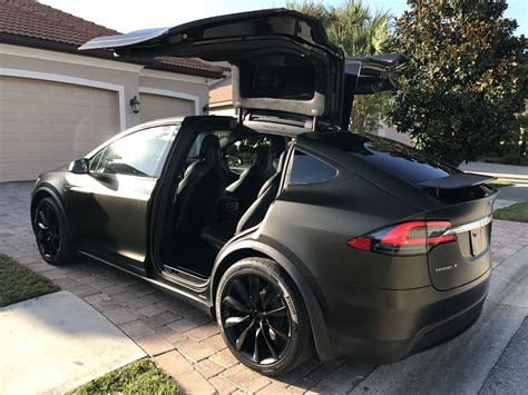 Tesla Model X Black Satin Gold Dust Vinyl Wrap With Carbon Fiber