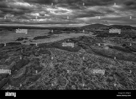 Vast Volcanic Moon Like Desert With Rocks Of Lava Hiden In The