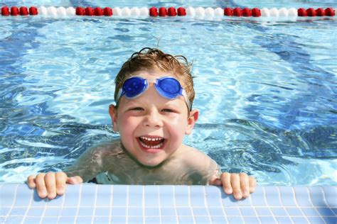 Happy Child In A Swimming Pool Dromelijn