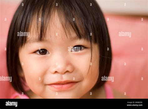 Little Asian Girl With Smiling Face Stock Photo Alamy