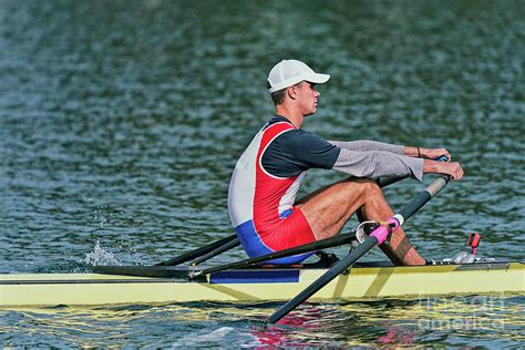 Man Rowing Scull Photograph By Microgen Imagesscience Photo Library