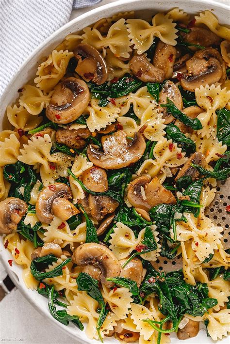 Baked salmon in foil couldn't be easier to make and results in juicy, succulent baked salmon and perfectly cooked asparagus. Parmesan Spinach Mushroom Pasta Skillet | Health dinner ...