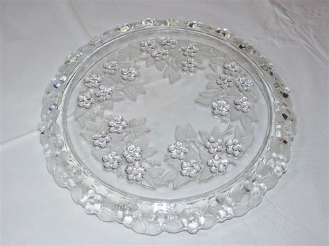 Alternating columns of 4 narrow pointed and 1 wide rounded. Mikasa Crystal Floral Carmen Pattern Cake Plate platter 13 ...