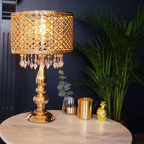 Your room will glisten and shimmer with little dancing rainbows. gold table moroccan lamp chandelier crystal bedside by ...