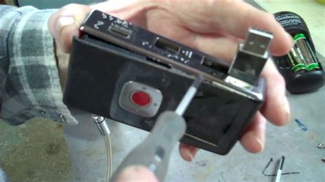 Repairing a broken power on switch on a Flip Camcorder ...