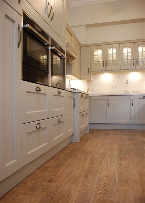 According to paint experts, one of the most impactful places to use green is on kitchen cabinetry. New Shaker kitchen painted in Biscuit colour with Brecon ...