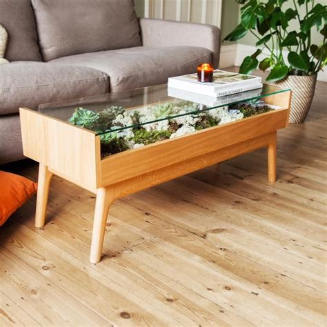 The shape and the style are elegant, and it is a seawater aquarium. Terrarium Table | Terrarium table, Coffee table terrarium ...