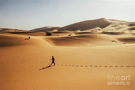 Man Walking In Desert Photograph By Caia Imagescience Photo Library