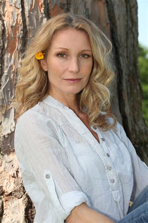 Blond Woman By A Tree Stock Image Image Of Leaning Breath 26320275