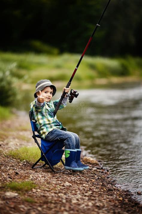 532 Little Boy Holding Fishing Rod Stock Photos Free And Royalty Free