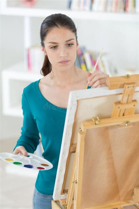Young Female Artist Painting Picture In Studio Stock Photo Image Of