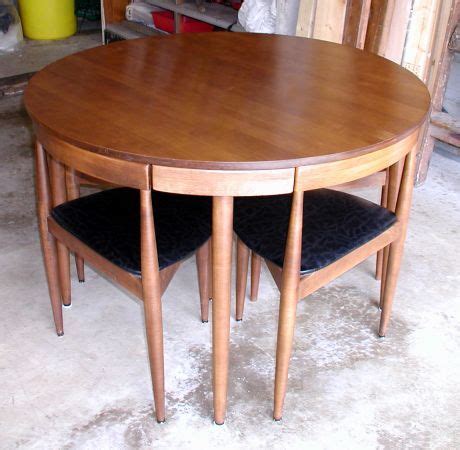 It's sturdy solid wood frame and legs are perfectly complemented by a beautiful veneer top. Washington DC: Mid-Century Modern Round Dining Room Table ...