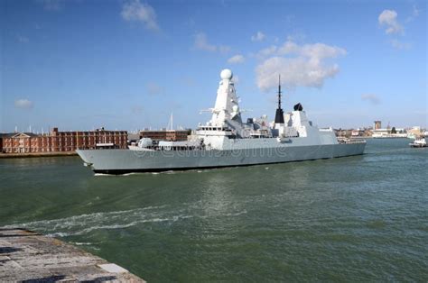 British Navy Destroyer Leaving Portsmouth Harbour Editorial Photo