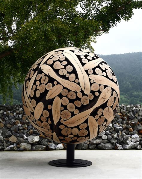 Elegant Wood Sculptures Crafted From Discarded Tree Trunks And Branches