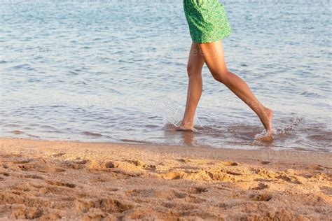 Beautiful Girl Legs Running On The Beach Pretty Girl Walking On Water