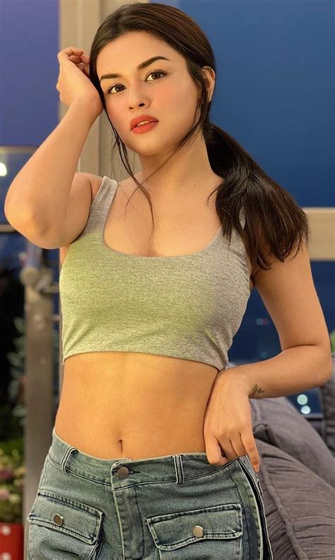 avneet kaur navel in green sleeveless top and jeans r navelnsfw