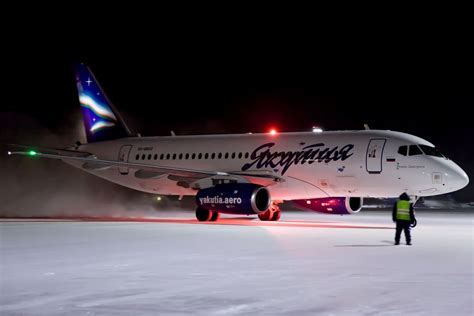 Yakutia Airlines Sukhoi Superjet Pulling On To Stand At Yakutsk In