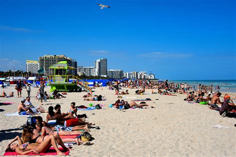 Crowds Sunning At South Beach In Miami Beach Florida Encircle Photos