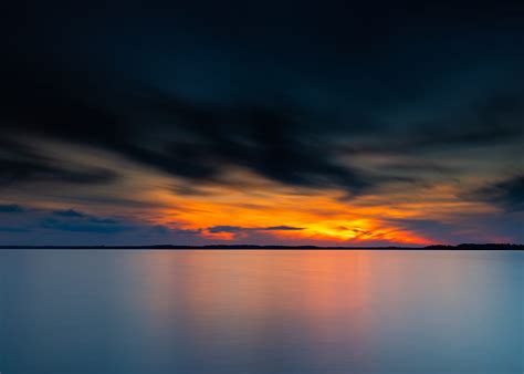 Body Of Water Under Cloudy Sky During Sunset Hd Wallpaper Peakpx