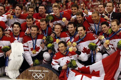 Canada Poses With Their Gold Medals After Defeating The Us 3 2 In