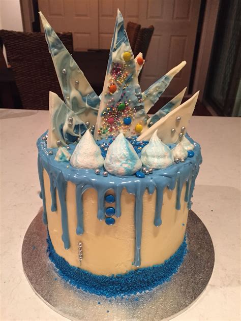 Hokey Pokey And Red Velvet Blue Drip Cake With Butter Cream And White