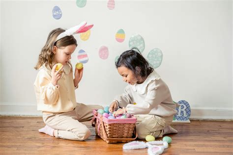 Cute Happy Diverse Children Sitting On Floor And Playing Together With