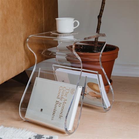 This Acrylic Side Table With A Built In Magazine Rack That Can Also