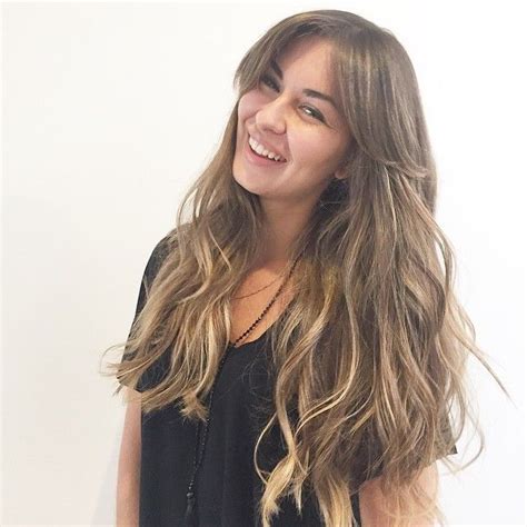 The smooth looking bangs can be. Long Layered Chestnut-Brown Hair with Long Parted Bangs ...