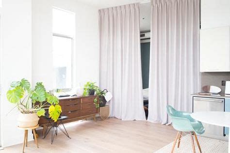 When hanging a curtain room divider from a drop ceiling, curtains can be hung in a number of ways, including hanging curtain rods, a pulley system or curtain track system. Do-It-Yourself Room Divider Installation - Ceiling Tracks ...