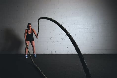 2k Free Download Woman Holding Exercise Ropes · Stock Women Battle