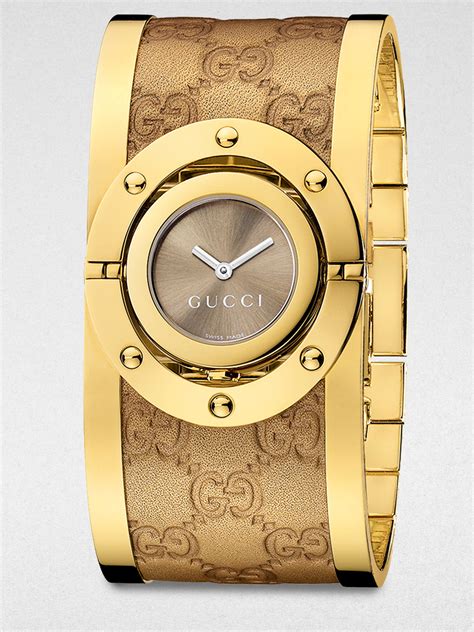 Lyst Gucci Twirl Goldtone Stainless Steel And Metallic Leather Bangle