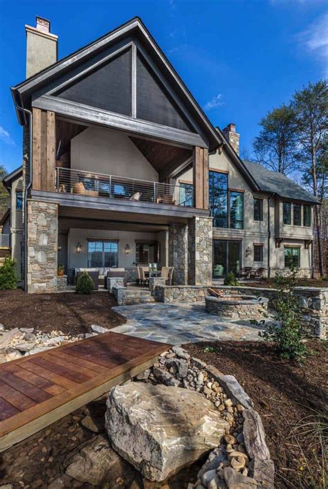 Exterior wood siding replicate rustic reclaimed wood siding and trim. Rustic lakefront retreat with luxurious details on shores ...