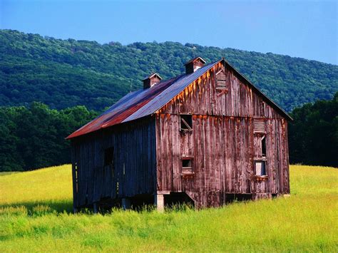 This 2 story building can be used as a workshop or for lots of storage or as a garage. Old Wv Mountain Barn Photograph by Joyce Kimble Smith