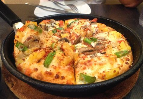 Vegans can order pizza hut's veggie lover's pizza and the great beyond pizza with no cheese. Veggie Temptation: ♥ Pizza Hut - Vegetarian-Friendly Restaurant in Singapore