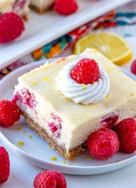 8) bake the cheesecake for 1 hour or up to 1 hour and 10 minutes, the sides of the cheesecake should be set but the center should slightly jiggle a bit (very. Lemon Raspberry Cheesecake Bars - A Fresh Fruity Dessert ...