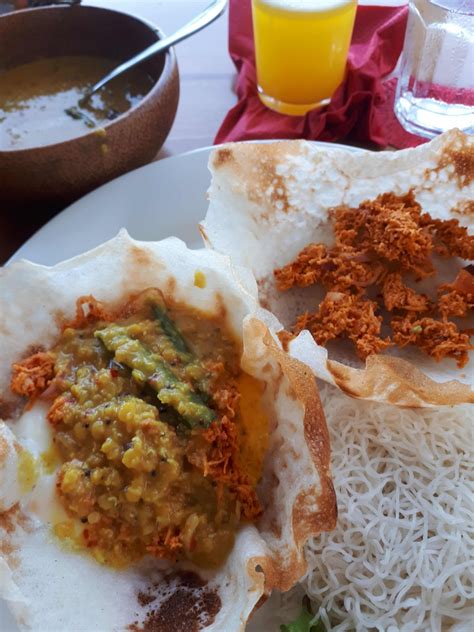 Rice And Egg Hoppers With Coconut Sambol And Daal Photo